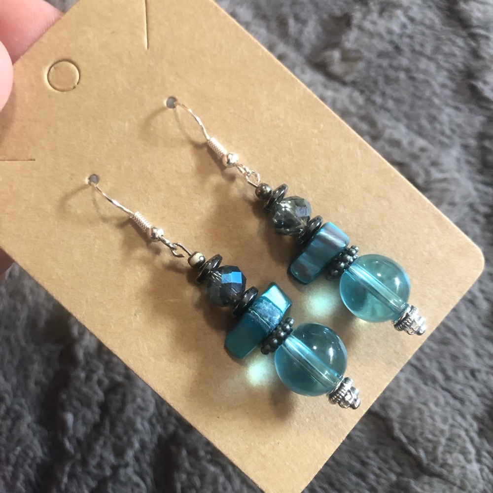 Handcrafted glass shell rhondelle hematite dangle earrings